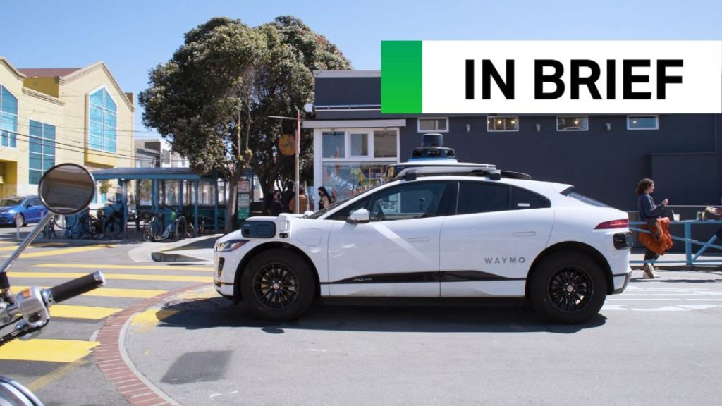 توقف سيارة أجرة آلية من Waymo أمام موكب VP Harris
